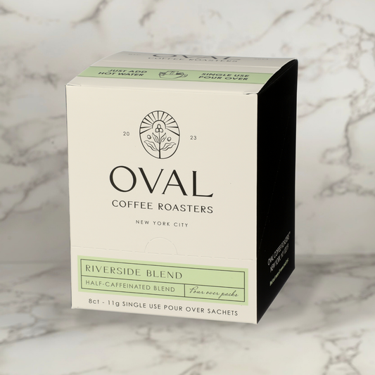 Oval Coffee Roasters Riverside Blend single-serve pour-over 8-pack Half Caff light roast coffee crafted with Swiss Water Process beans for smooth balanced flavor