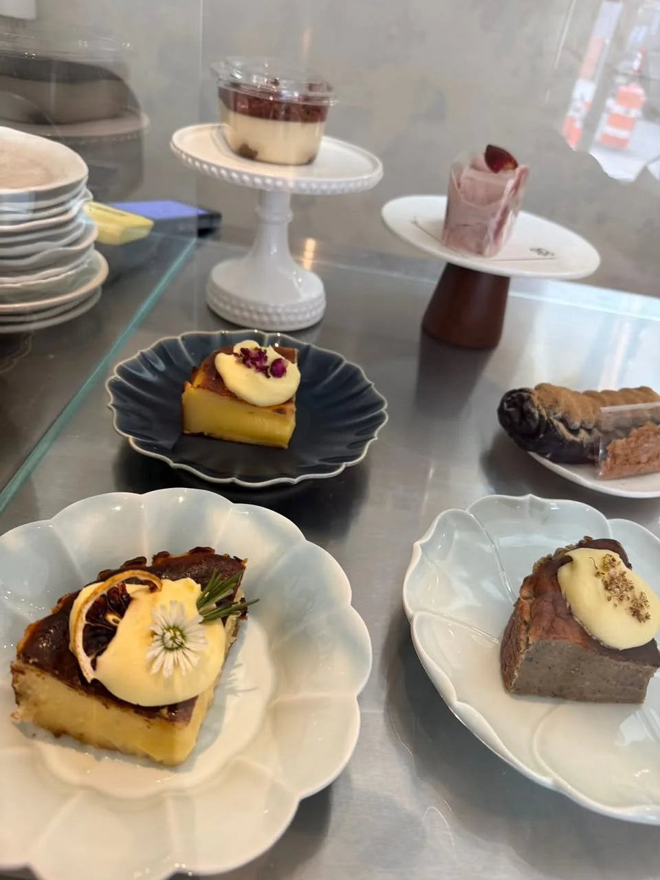 Pastries and drinks arranged on a café counter.