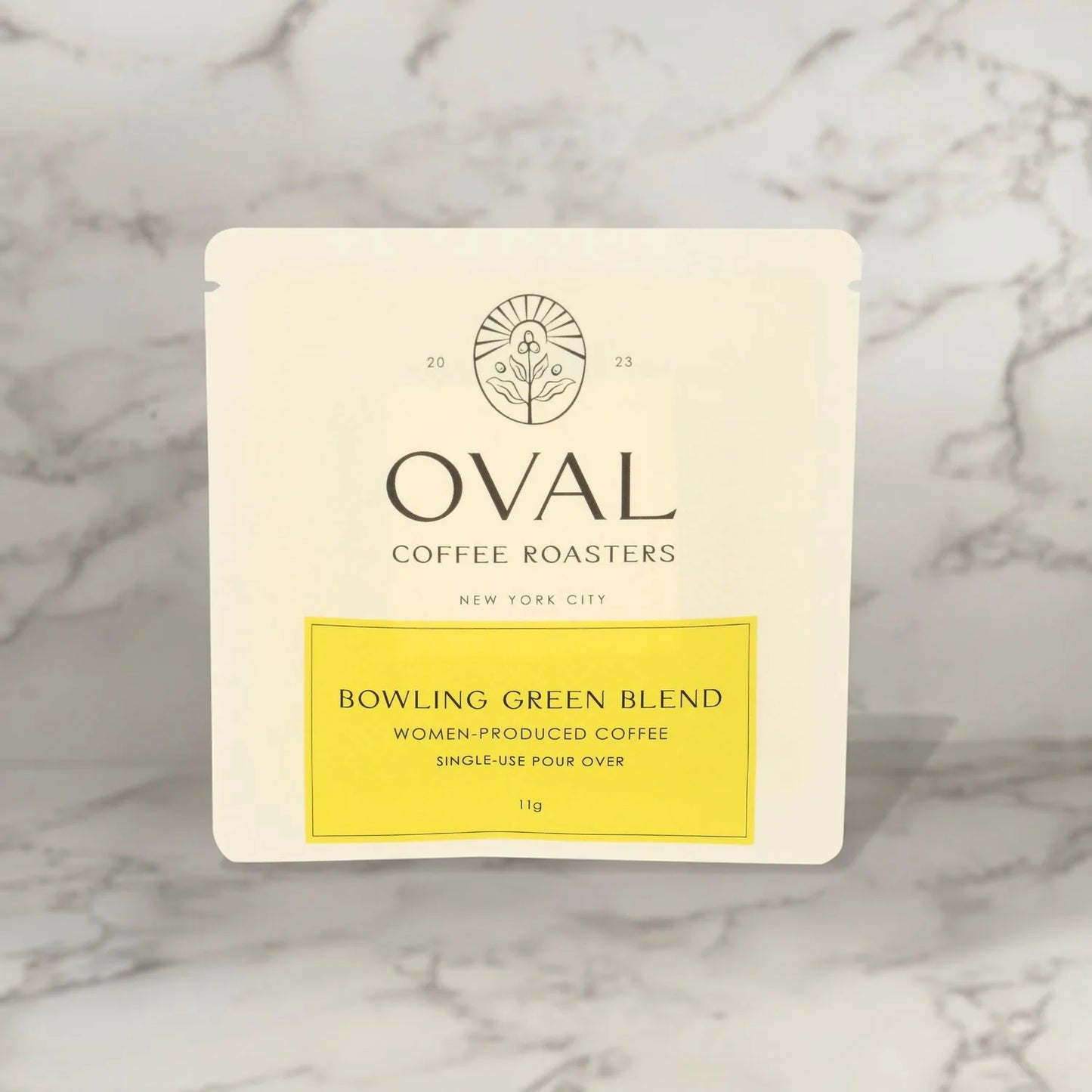 Oval Coffee Roasters Bowling Green 11g single-serve pour-over drip filter bag sleeve, women-produced light roast coffee roasted in New York City, designed to brew directly over a cup without equipment