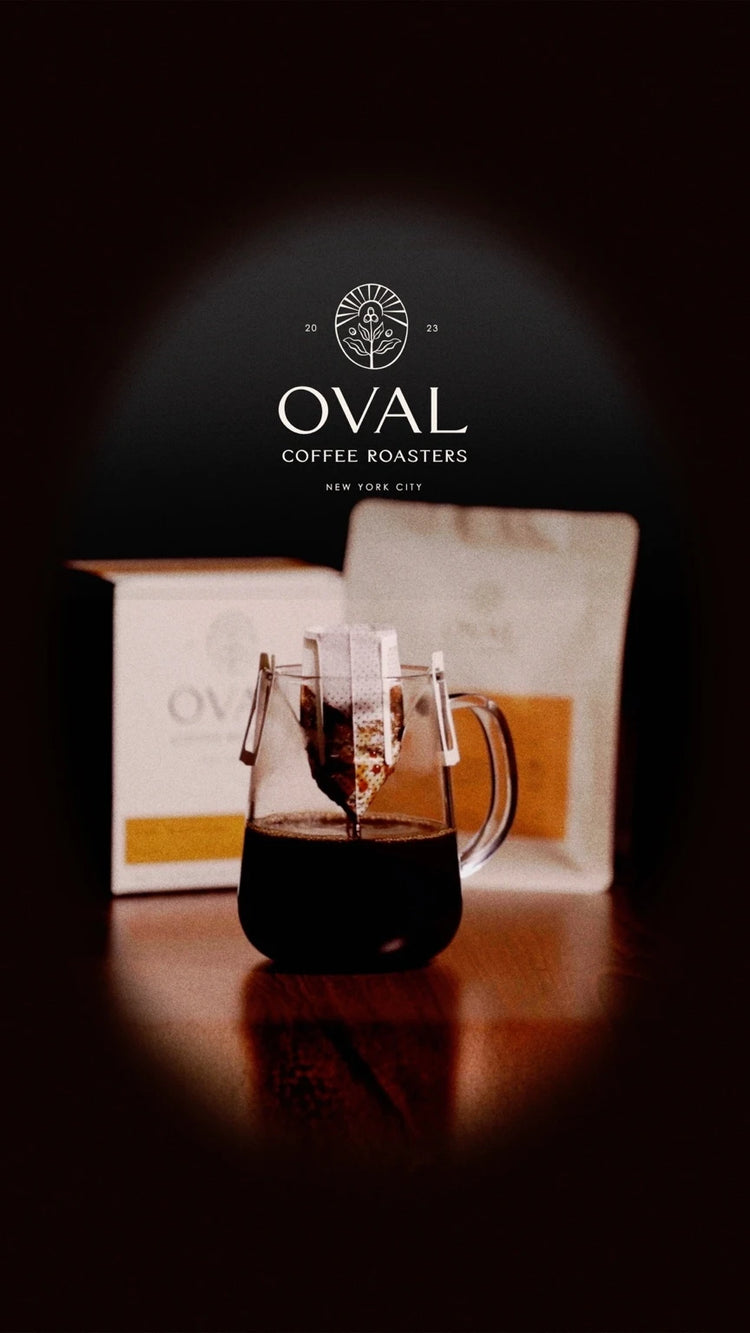Oval Coffee Roasters natural process coffee pour over single serve brewing in glass mug NYC roasted light medium roast fruit forward specialty coffee
